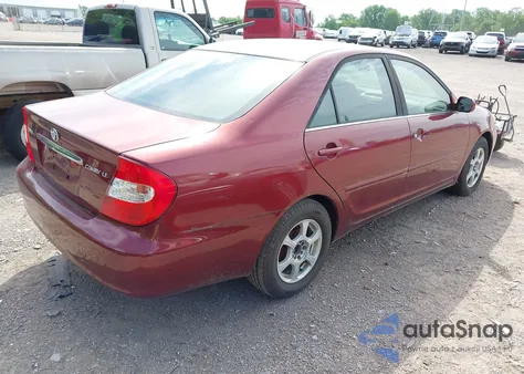 2004 Toyota Camry Le z USA, uszkodzony, nr VIN 4T1BE30K14U306583